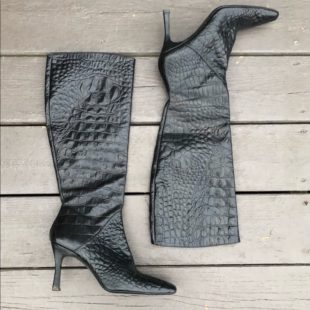 Knee-high black leather boots